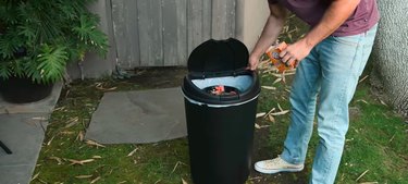 clean trash can with baking soda