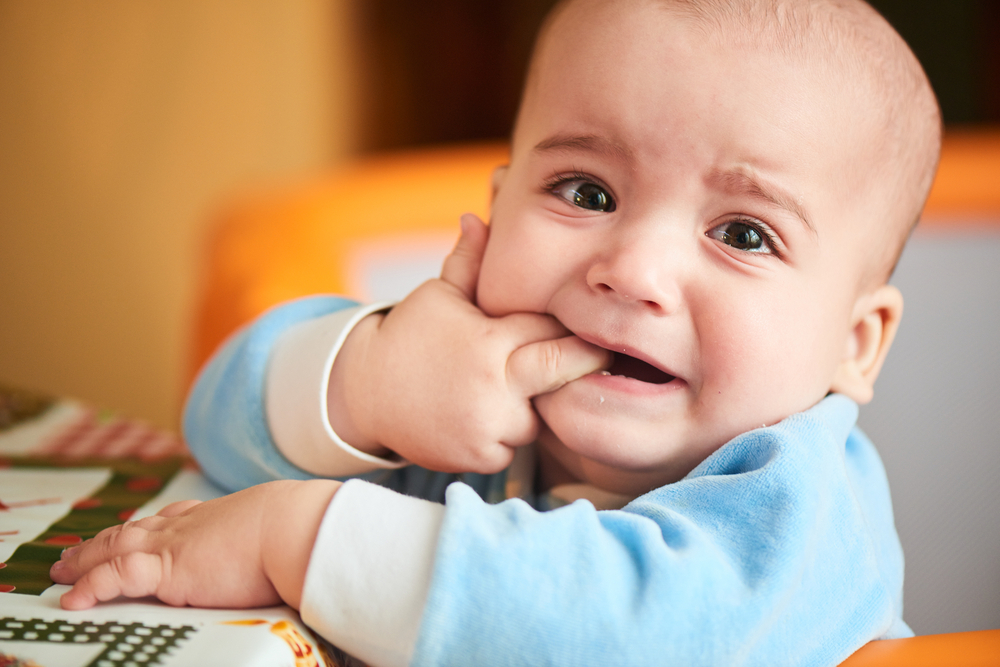 teething baby crying